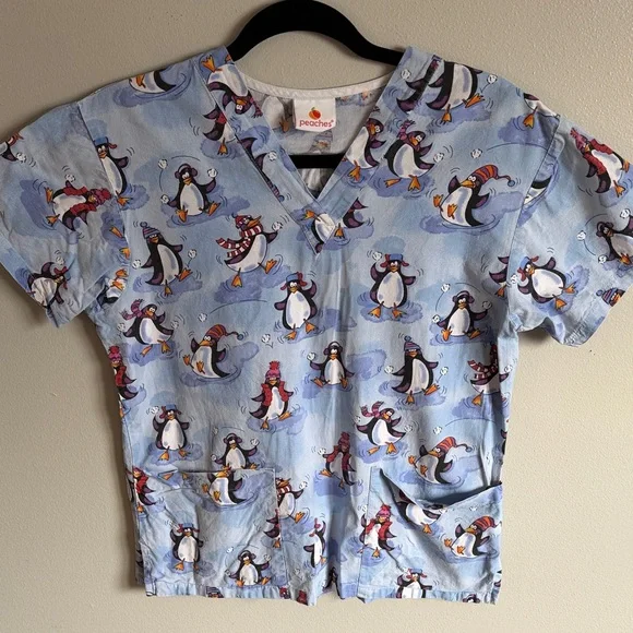 Peaches Uniforms Light Blue Penguin Print Scrub Top - Picture 1 of 4